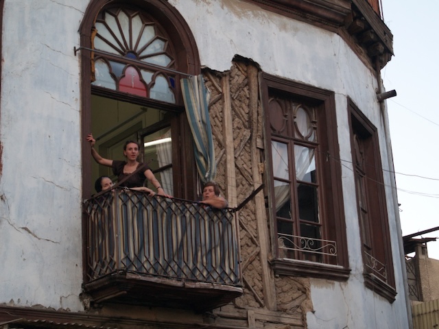 Three ladies on a balcony